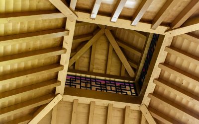 When to Call a Professional for Wood Roof Repairs
